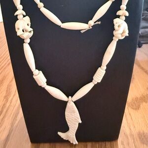 Vintage Hand Carved Bovine Bone Beaded Necklace with Fish and Elephant Motifs
